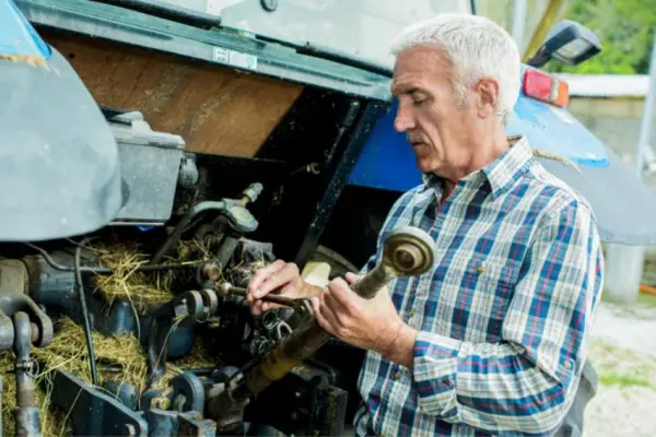 man-checking-engine
